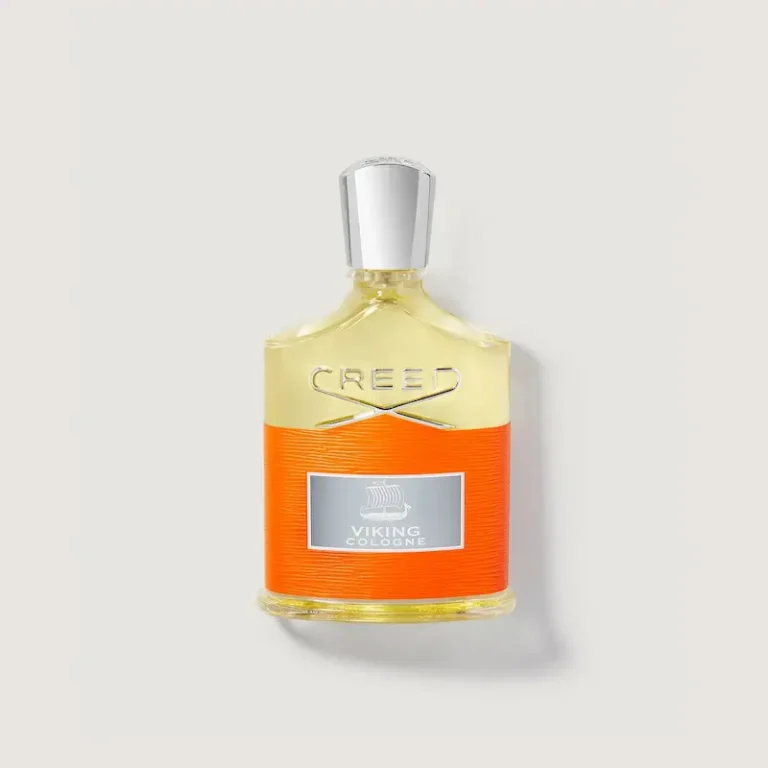 Creed Viking Cologne 2021 bottle with citrus and herbal notes, displayed against a Nordic spring-inspired background